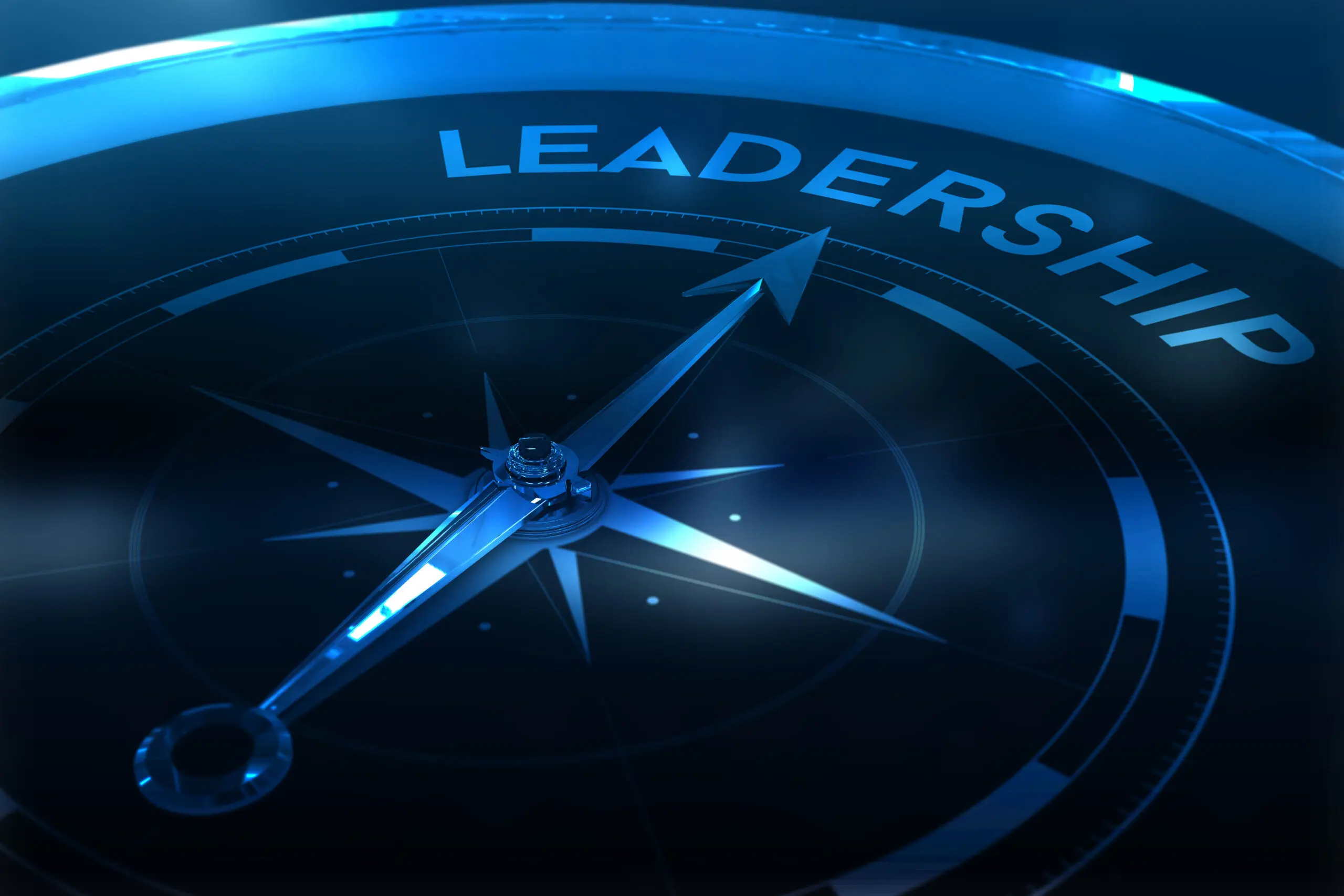 Compass pointing to leadership against purple vignette Compass pointing to leadership against purple vignette