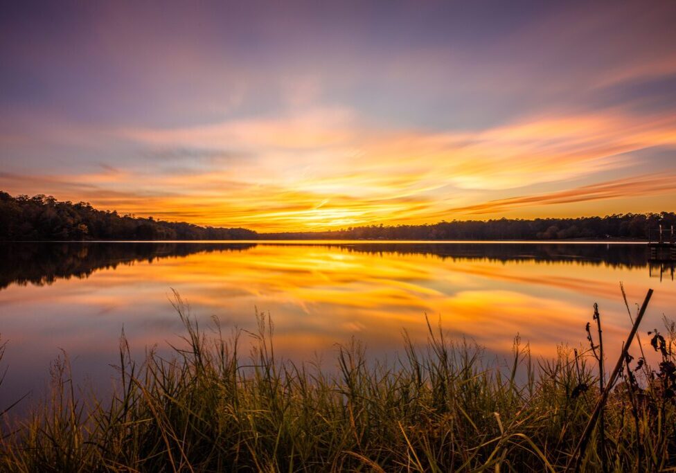A Sunset At Davis Lake. 
At the mile post 243 exit on the Natchez Trace and about 4 miles you'll meet this 200 acre lake in Houston Mississippi.
Lots of fishing and camping here and a great setting for dramatic sunsets.